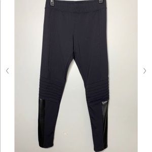 Black leggings with faux leather details